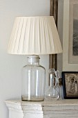 THE KAPARELLI ESTATE  CORFU - GLASS LAMP BASE WITH PLEATED IVORY SHADE