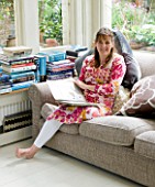 JOA STUDHOLMES LONDON HOME: JOA RELAXING ON HER SOFA