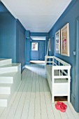JOA STUDHOLMES LONDON HOME: HALLWAY WITH WHITE PAINTED WOODEN FLOOR