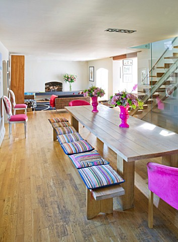 PAULA_PRYKES_HOUSE__SUFFOLK_VIEW_OF_DINING_ROOM_WITH_LONG_CUSTOM_MADE_REFECTORY_TABLE_AND_BENCH_WITH