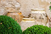 LA CARMEJANE, FRANCE: LUBERON, PROVENCE, TERRACE, PATIO WITH TERRACOTTA CONTAINERS, CLIPPED, TOPIARY, BOX, BALLS, GREEN, FRENCH, COUNTRY, GARDEN
