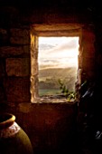 LA CARMEJANE, FRANCE: LUBERON, PROVENCE, CONTAINERS, URN, SUNRISE, MIST, TOWER, FRENCH, COUNTRY, GARDEN, WINDOW, VIEW OUT OF