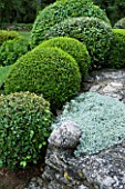 WACHTER HOUSE  FRANCE -  GREY STONE AND CLIPPED TOPIARY SHAPES BY NICOLE DE VESIAN