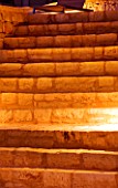 CORFU  GREECE: DESIGNER: DOMINIC SKINNER - MEDITTERANEAN STYLE GARDEN  - BEAUTIFUL STONE STEPS  LIT UP AT NIGHT  LIGHTING