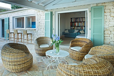 PRIVATE_VILLA__CORFU__GREECE_DESIGN_BY_ALITHEA_JOHNS__BAR_AND_PATIO_WITH_RATTAN_CHAIR_FURNITURE_A_PL