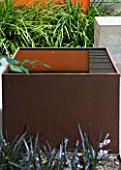 DESIGNERS WYNNIAT- HUSEY CLARKE: MODERN  CONTEMPORARY TOWN GARDEN IN BRIGHTON - SQUARE METAL WATER FEATURE WITH SHADOW/ REFLECTION OF ORANGE PANEL ON WALL