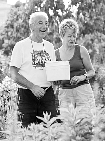 MEADOW_FARM__WORCESTERSHIRE_BLACK_AND_WHITE_IMAGE_OF_ROBERT_AND_DIANE_COLE_IN_THEIR_GARDEN