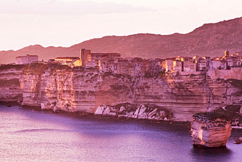 CORSICA__CLIFFS_AND_TOWN_OF_BONIFACCIO_AT_SUNSET