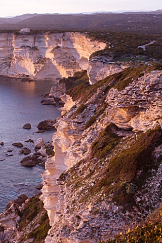 CORSICA__CLIFFS_BESIDE_THE_TOWN_OF_BONIFACCIO_AT_SUNSET
