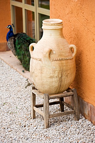 DESIGNERS_ERIC_OSSART_AND_ARNAUD_MAURIERES__MOROCCO_AL_HOSSOUN__TERRACOTTA_CONTAINER_WITH_PEACOCK_BY