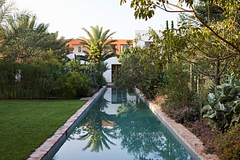 DESIGNERS_ERIC_OSSART_AND_ARNAUD_MAURIERES__MOROCCO_AL_HOSSOUN__THE_MAIN_POOLCANAL_REFLECTING_A_SOLA