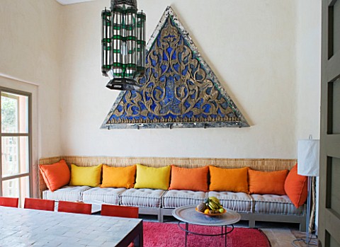 DESIGNERS_ERIC_OSSART_AND_ARNAUD_MAURIERES__MOROCCO_AL_HOSSOUN__LIVING_ROOM_WITH_ORANGE_AND_YELLOW_C