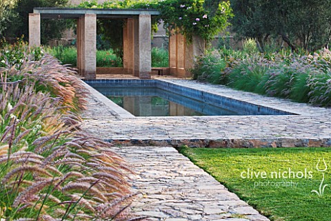 DESIGNERS_ERIC_OSSART_AND_ARNAUD_MAURIERES__MOROCCO_DAR_IGDAD__SWIMMING_POOL_AND_RAMMED_EARTH_PERGOL