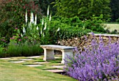 PRIVATE GARDEN, COTSWOLDS: DESIGNER ALISON HENRY - LAWN AND STONE SEAT WITH WHITE FOXLOVES AND NEPETA - CATMINT, CLASSIC, ENGLISH GARDEN, A PLCE TO SIT, BENCH, STONE WALL