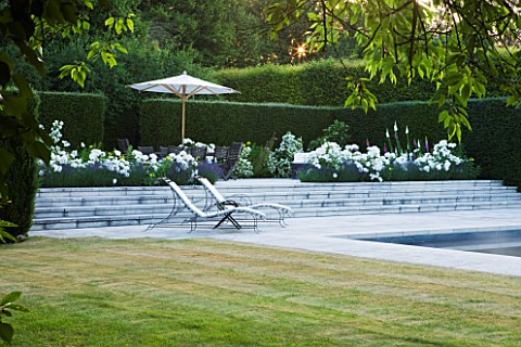 PRIVATE_GARDEN_COTSWOLDS_DESIGNER_ALISON_HENRY__LAWN_SWIMMING_POOL_TERRACE__PATIO__ROSE_WINCHESTER_C