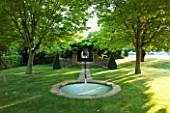 DESIGNER ALISON HENRY - PRIVATE GARDEN, COTSWOLDS: LAWN AND RILL TO FORMAL ROUND POND / POOL - LAWN, STONE PIERS WITH URNS, CONTAINERS, FORMAL, WATER, CLASSIC,  ENGLISH,  GARDEN