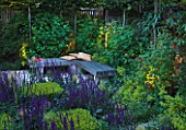 DESIGNER CHARLOTTE ROWE, LONDON: SMALL, TOWN, CITY, GARDEN, WOODEN, BENCH, CUSHIONS, FENCES, FENCING, CHAIRS, SEATS, PATIO, TERRACE, ENTERTAINING, SUMMER, ALCHEMILLA, MOLLIS