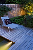 DESIGNER CHARLOTTE ROWE, LONDON: SMALL, TOWN, CITY, GARDEN, DECKS, DECKING, SUN, LOUNGERS, SEATS, FENCES, FENCING, CUSHIONS, LIGHTING. LIGHTS, WATER, POND, POOL, FENCES, FENCING