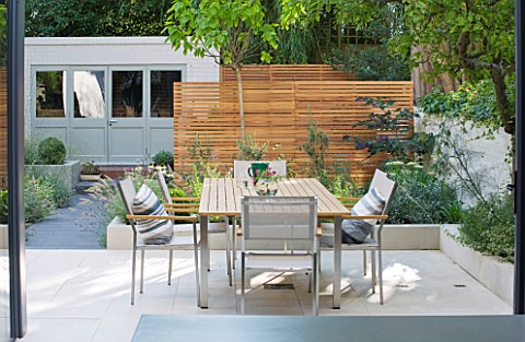 JARDINROSAINSPIRATIONS__SMALL_TOWN_GARDEN_VIEW_FROM_KITCHEN_TO_WHITE_PORCELAIN_TILED_DINING_AREA_PAT