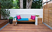 @JARDINROSAINSPIRATIONS - SMALL TOWN GARDEN: HANDMADE WHITE PAINTED OUTDOOR SOFA. A  PLACE TO SIT - PINK CUSHIONS
