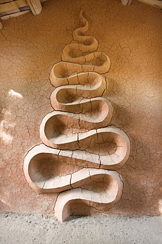 DIGNE_LES_BAINS__FRANCE_RED_CLAY_SCULPTURE_BY_ANDY_GOLDSWORTHY_IN_THE_MOUNTAIN_REFUGE_OF_VIEIL_ESCLA