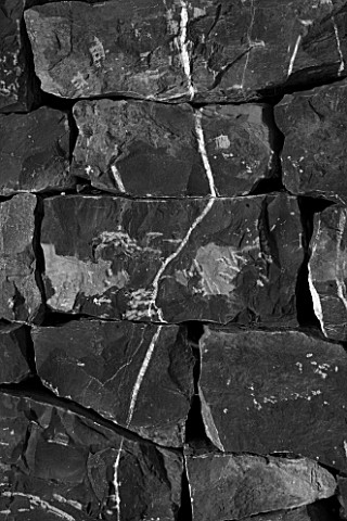 DIGNE_LES_BAINS__FRANCE_BLACK_AND_WHITE_IMAGE_OF_WHITE_LINES_ON_BLACK_ROCK_BY_ANDY_GOLDSWORTHY