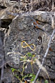 DIGNE LES BAINS  FRANCE: GOLD INFINITY SIGN IN ROCK BY HERMAN DE VRIES