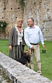 NINFA GARDEN, GIARDINI DI NINFA, ITALY: PROPERTY MANAGER LAURO MARCHETTI AND HIS WIFE WITH THEIR DOG