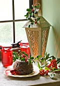 DESIGNER - JACKY HOBBS : CHRISTMAS DECORATION - CANDLE IN LANTERN   JARS OF JAM  CHRISTMAS PUDDING  HOLLY BERRIES AND LEAVES  IN WINDOWSILL