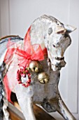 DESIGNER CAROLYN MINTY  GLOUCESTERSHIRE - CHRISTMAS ROCKING HORSE IN BEDROOM