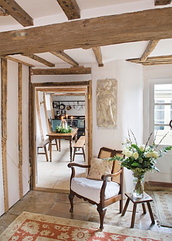 DESIGNER_CAROLYN_MINTY__GLOUCESTERSHIRE__VIEW_THROUGH_THE_SITTING_ROOM_INTO_THE_DINING_ROOM