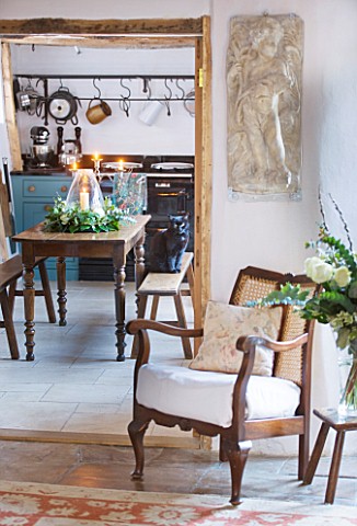DESIGNER_CAROLYN_MINTY__GLOUCESTERSHIRE__VIEW_THROUGH_THE_SITTING_ROOM_INTO_THE_DINING_ROOM