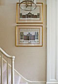 DESIGNER JANE CHURCHILL : NARROW HALLWAY - FRAMED PRINTS ON WALL BY STAIRCASE