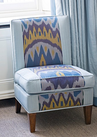 DESIGNER_JANE_CHURCHILL__CHAIR_IN_DRAWING_ROOM_UPHOLSTERED_WITH_IKAT_FABRIC_FROM_ISTANBUL