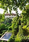 GARDEN OF PAOLO PEJRONE  ITALY: THE HOUSE SEEN FROM THE GARDEN WITH POOL IN FOREGROUND