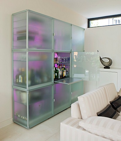 CAKE_BOY_HOUSE__LONDON_LED_LIT_FROSTED_GLASS_STORAGE_CABINET_BY_EO__IN_THE_LIVING_ROOM