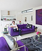 CAKE BOY HOUSE  LONDON: ERIC LANLARD  CAKE BOY  RELAXING IN HIS LIVING ROOM