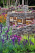 CHELSEA 2011 - RBC NEW WILD GARDEN DESIGNED BY NIGEL DUNNETT - DRY STONE WALLS WITH INSECT HOUSES