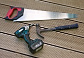 DESIGNER CLARE MATTHEWS - DECKING PROJECT - SAW  HAMMER AND DRILL USED TO MAKE A DECK