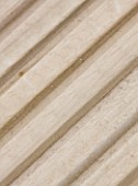 DESIGNER CLARE MATTHEWS - DECKING PROJECT - CLOSE UP OF A DECK BOARD SHOWING GROOVES