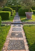 LES CONFINES  PROVENCE  FRANCE - DESIGNER: DOMINIQUE LAFOURCADE - CLIPPED HEDGES AND A PEBBLE AND BRICK PATH