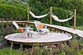 DECKING PROJECT - DESIGNER CLARE MATTHEWS - CIRCULAR DECK WITH DECK CHAIRS AND HAMMOCKS