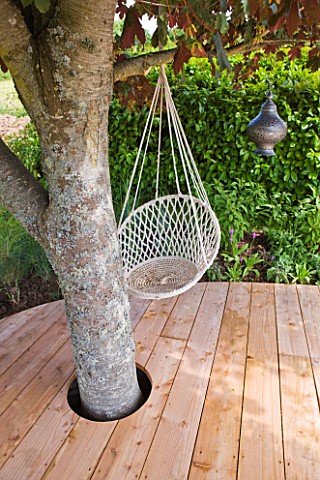 DECKING_PROJECT__DESIGNER_CLARE_MATTHEWS__DECKS_WITH_TREE_AND_HANGING_CHAIR