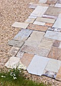 DESIGNER: CLARE MATTHEWS  DEVON - PAVING PROJECT - CLOSE UP OF GRAVEL AND PATIO MADE FROM SLABS