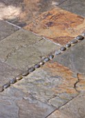 KARLA NEWELL GARDEN  BRIGHTON: SMALL TOWN GARDEN - SLATE TILE FLOOR DECORATED WITH PEBBLES