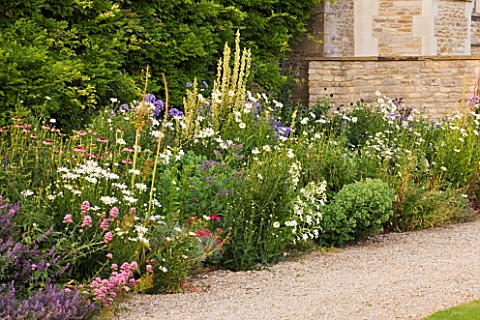 WHATLEY_MANOR__WILTSHIRE_HERBACEOUS_BORDER_BESIDE_THE_HOTEL__LATE_SUMMER__SUNSET