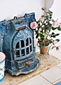 AMANDA KNOX HOUSE  GRANTHAM: DINING ROOM WITH BLUE STOVE FROM NEWARK ANTIQUES FAIR