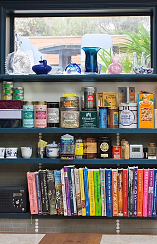 CHANTAL_COADY_HOUSE__LONDON_DETAIL_OF_SPICE_SHELVES_AND_COOKBOOKS_IN_THE_KITCHEN