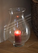 JACKY HOBBS HOUSE  LONDON: GLASS STORM LANTERN WITH RED CANDLE
