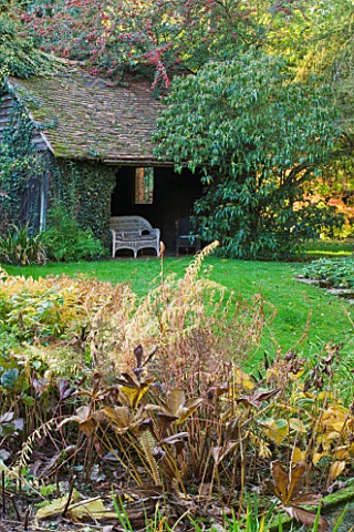 SALING_HALL__ESSEX_THE_WATER_GARDEN_IN_AUTUMN_WITH_PRIVATE_TEA_HOUSE_BHIND